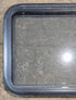 Used Black Radius Emergency Opening Window : 29 1/2" W x 21 1/2" H x 1 1/2" - Young Farts RV Parts
