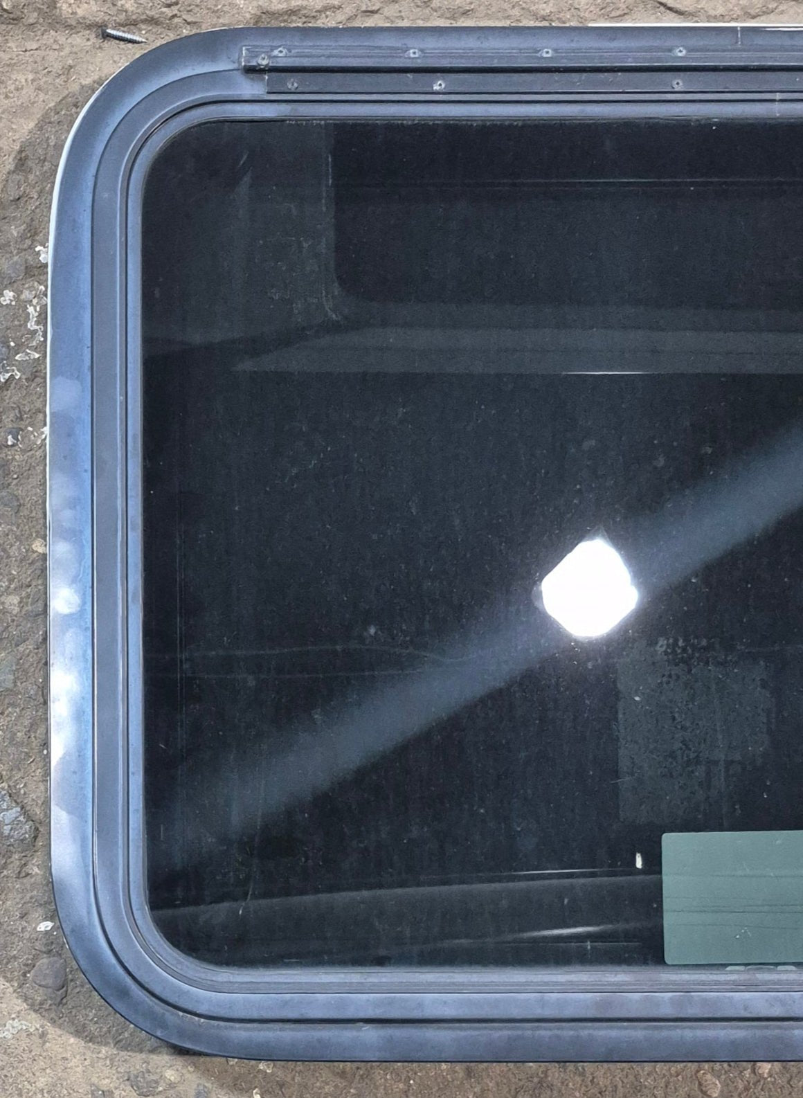 Used Black Radius Emergency Opening Window : 29 1/2" W x 21 1/2" H x 1 3/4" - Young Farts RV Parts