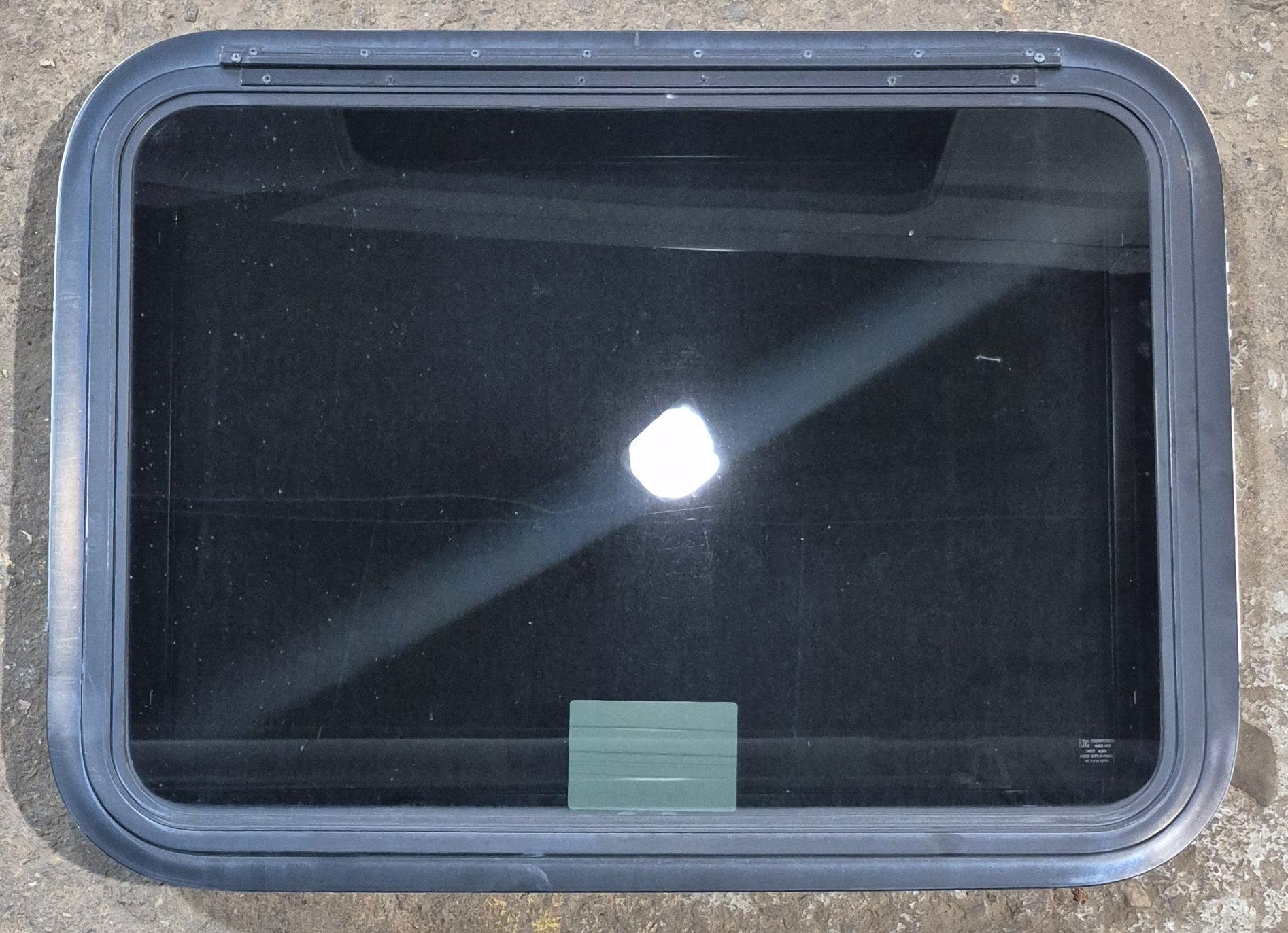 Used Black Radius Emergency Opening Window : 29 1/2" W x 21 1/2" H x 1 3/4" - Young Farts RV Parts