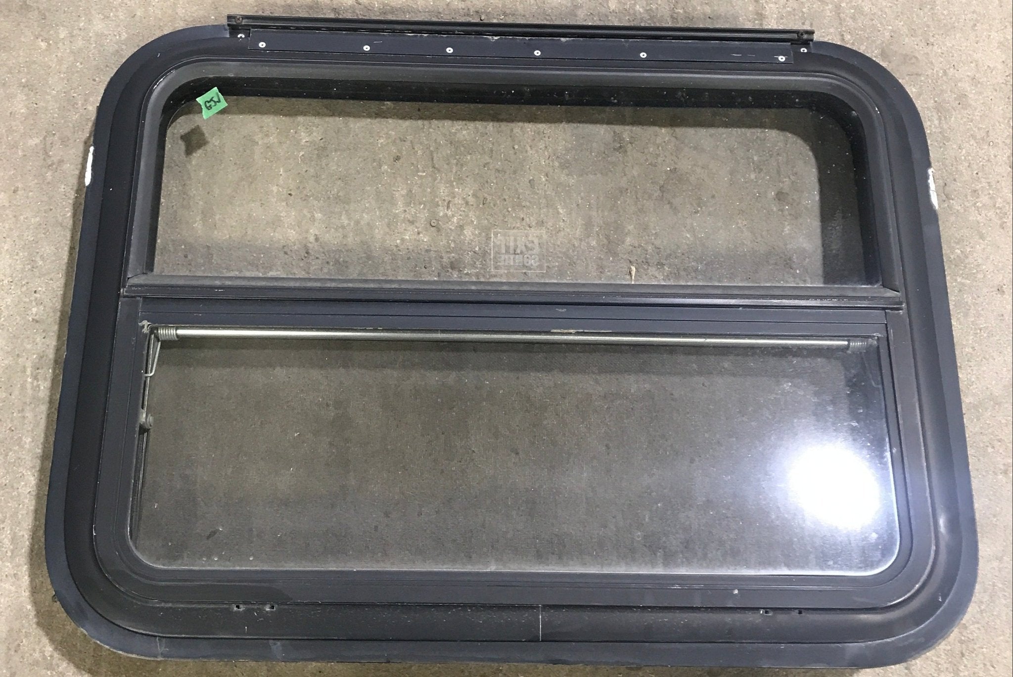 Used Black Radius Emergency Opening Window : 29 1/2" W x 21 1/2" H x 1 7/8" D - Young Farts RV Parts
