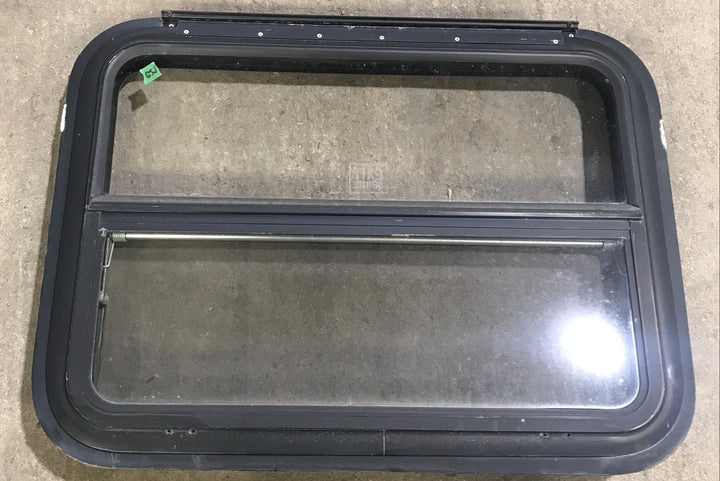 Used Black Radius Emergency Opening Window : 29 1/2" W x 21 1/2" H x 1 7/8" D - Young Farts RV Parts