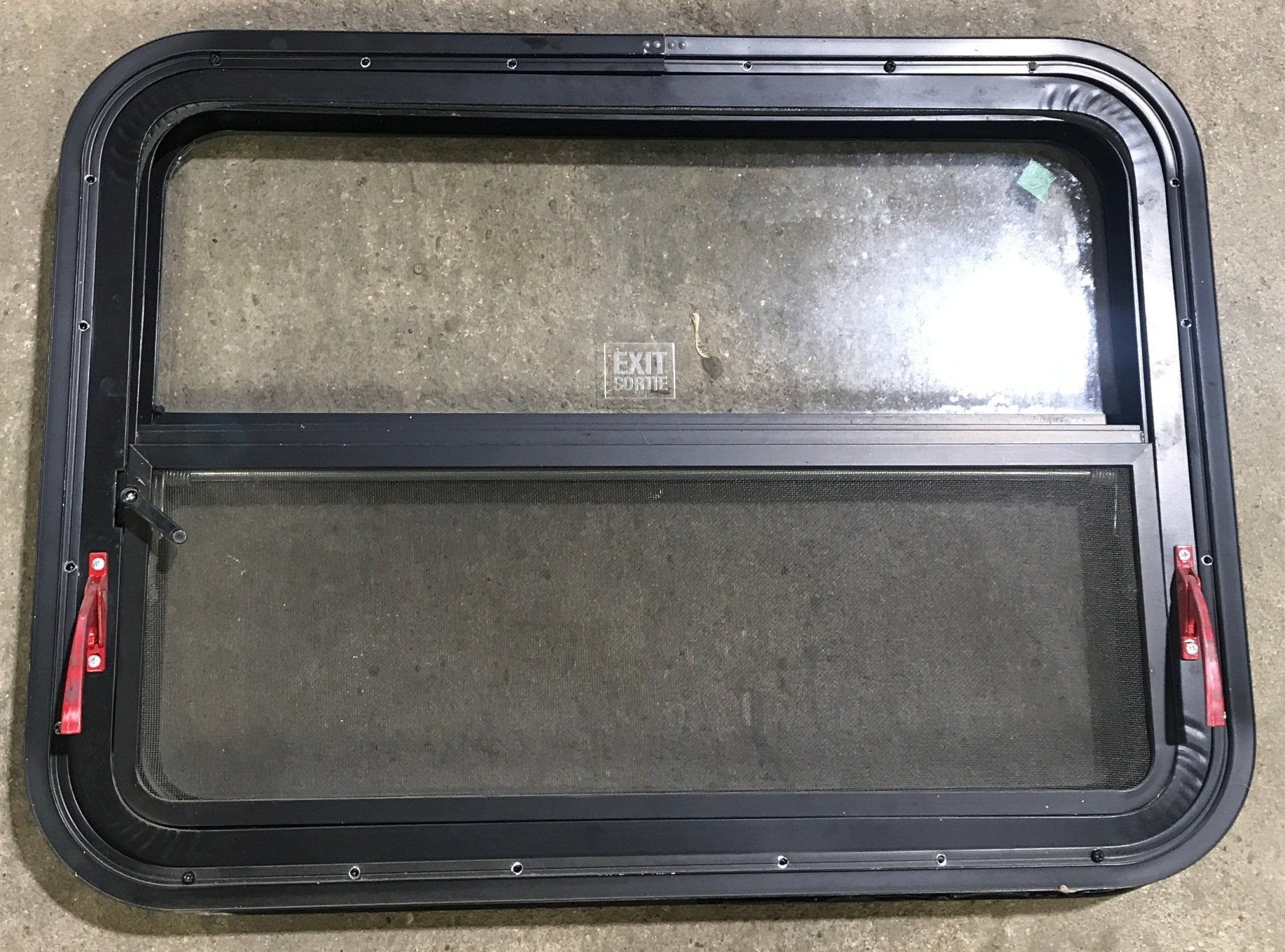 Used Black Radius Emergency Opening Window : 29 1/2" W x 21 1/2" H x 1 7/8" D - Young Farts RV Parts