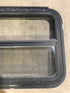Used Black Radius Emergency Opening Window : 29 1/2" W x 21 1/2" H x 1 7/8" D - Young Farts RV Parts