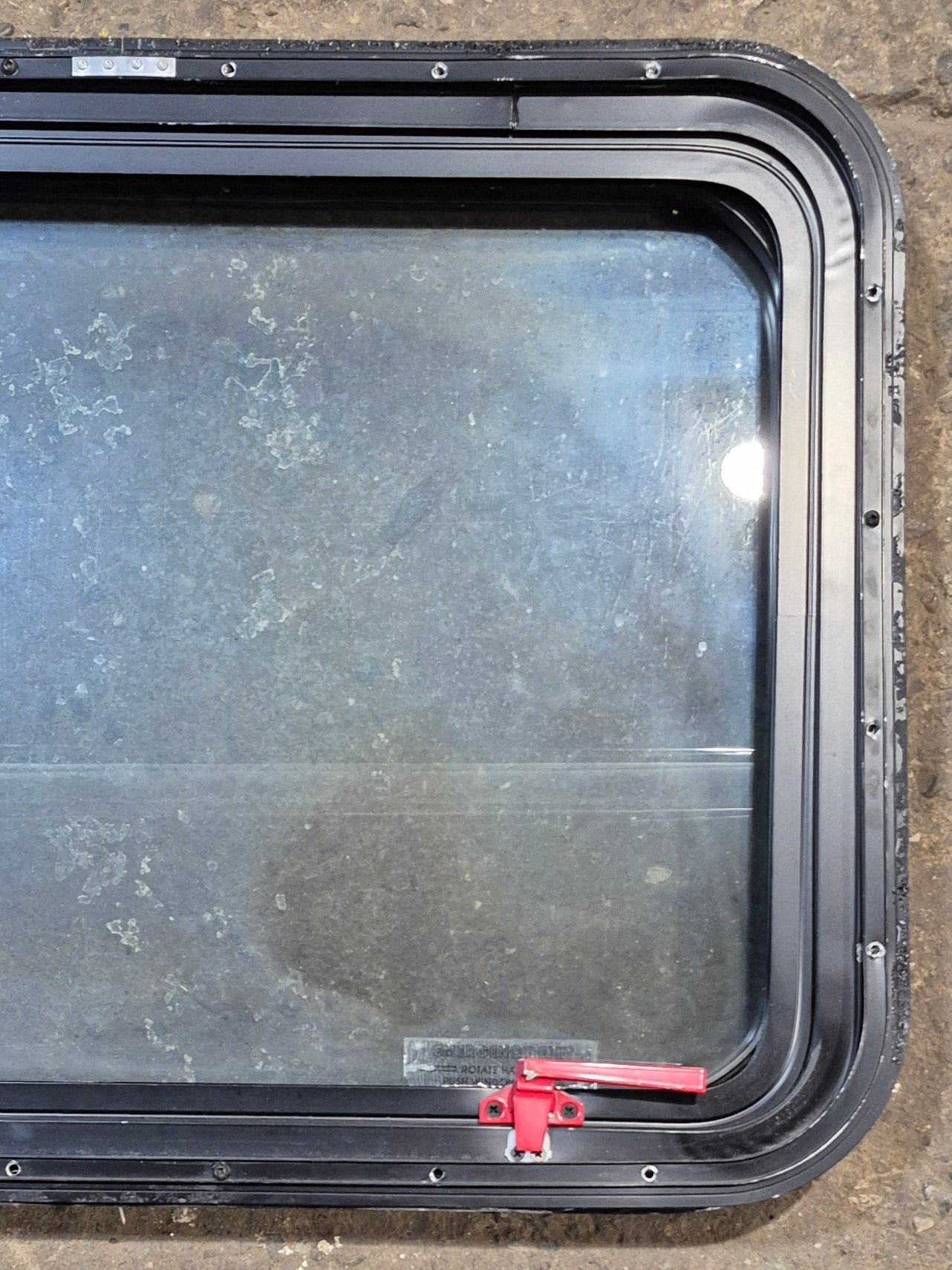 Used Black Radius Emergency Opening Window : 29 1/2" W x 21 1/2" H x 2" D - Young Farts RV Parts