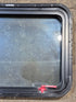 Used Black Radius Emergency Opening Window : 29 1/2" W x 21 1/2" H x 2" D - Young Farts RV Parts