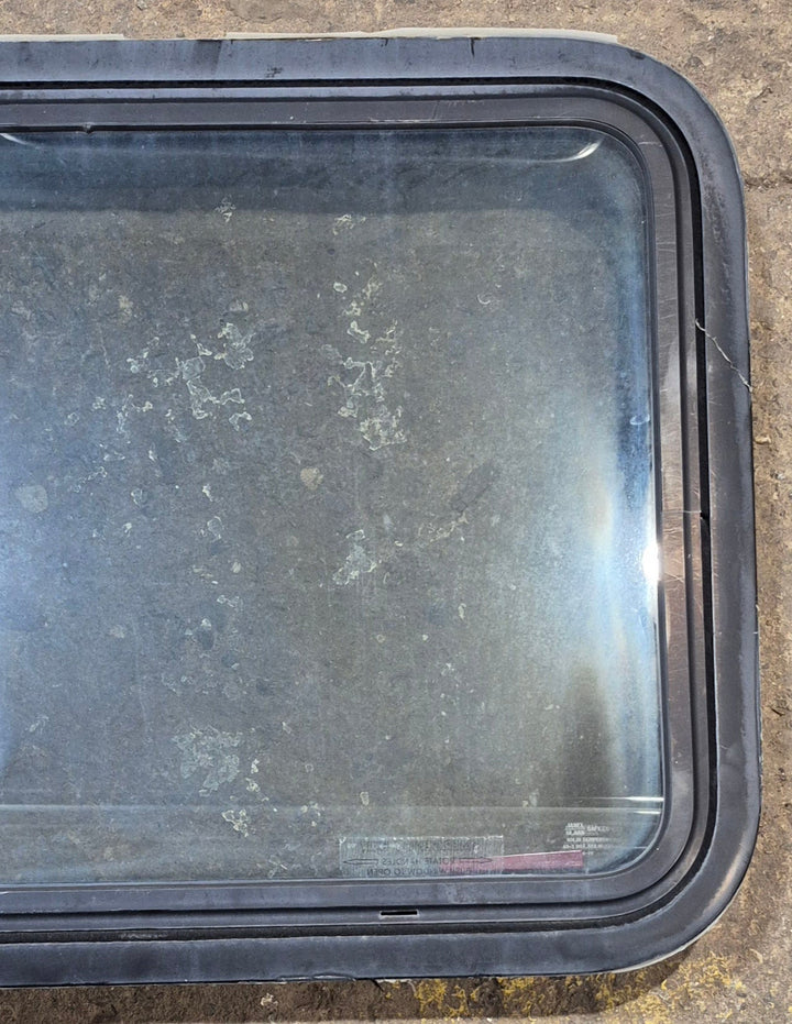 Used Black Radius Emergency Opening Window : 29 1/2" W x 21 1/2" H x 2" D - Young Farts RV Parts