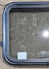 Used Black Radius Emergency Opening Window : 29 1/4" W x 21 1/2" H x 1 3/4" - Young Farts RV Parts