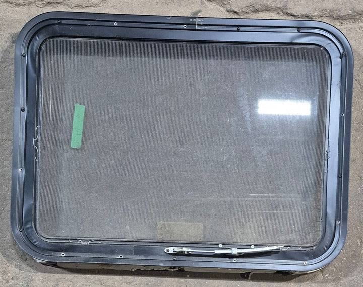 Used Black Radius Emergency Opening Window : 29 1/4" W x 21 1/4" H x 1 7/8" D - Young Farts RV Parts