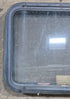 Used Black Radius Emergency Opening Window : 29 1/4" W x 21 1/4" H x 1 7/8" D - Young Farts RV Parts