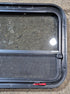 Used Black Radius Emergency Opening Window : 31 1/2" W x 23 1/2" H x 1 7/8" - Young Farts RV Parts
