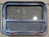 Used Black Radius Emergency Opening Window : 31 1/2" W x 23 1/2" H x 1 7/8" - Young Farts RV Parts