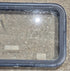Used Black Radius Emergency Opening Window : 35 1/2" W x 18 1/2" H x 1 7/8" - Young Farts RV Parts