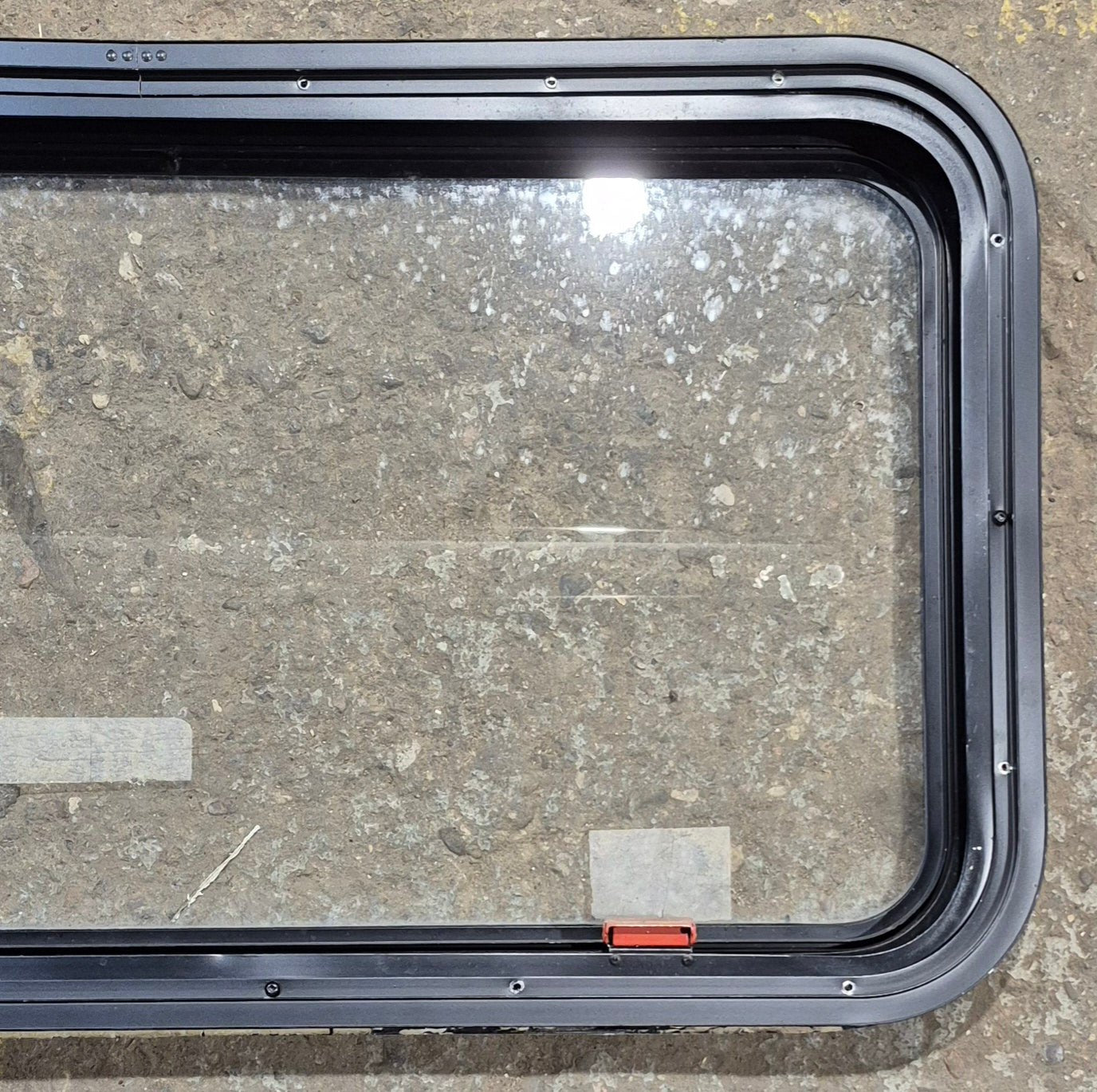 Used Black Radius Emergency Opening Window : 35 1/2" W x 18 1/2" H x 1 7/8" - Young Farts RV Parts