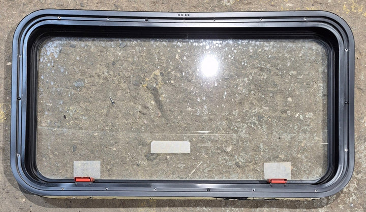 Used Black Radius Emergency Opening Window : 35 1/2" W x 18 1/2" H x 1 7/8" - Young Farts RV Parts