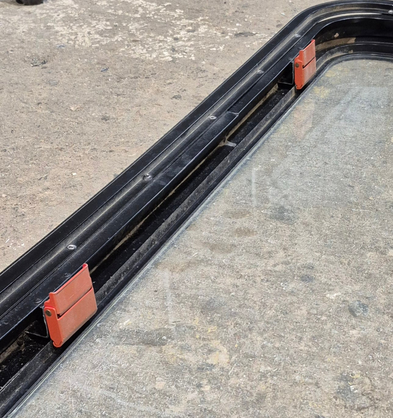 Used Black Radius Emergency Opening Window : 35 1/2" W x 18 1/2" H x 1 7/8" - Young Farts RV Parts