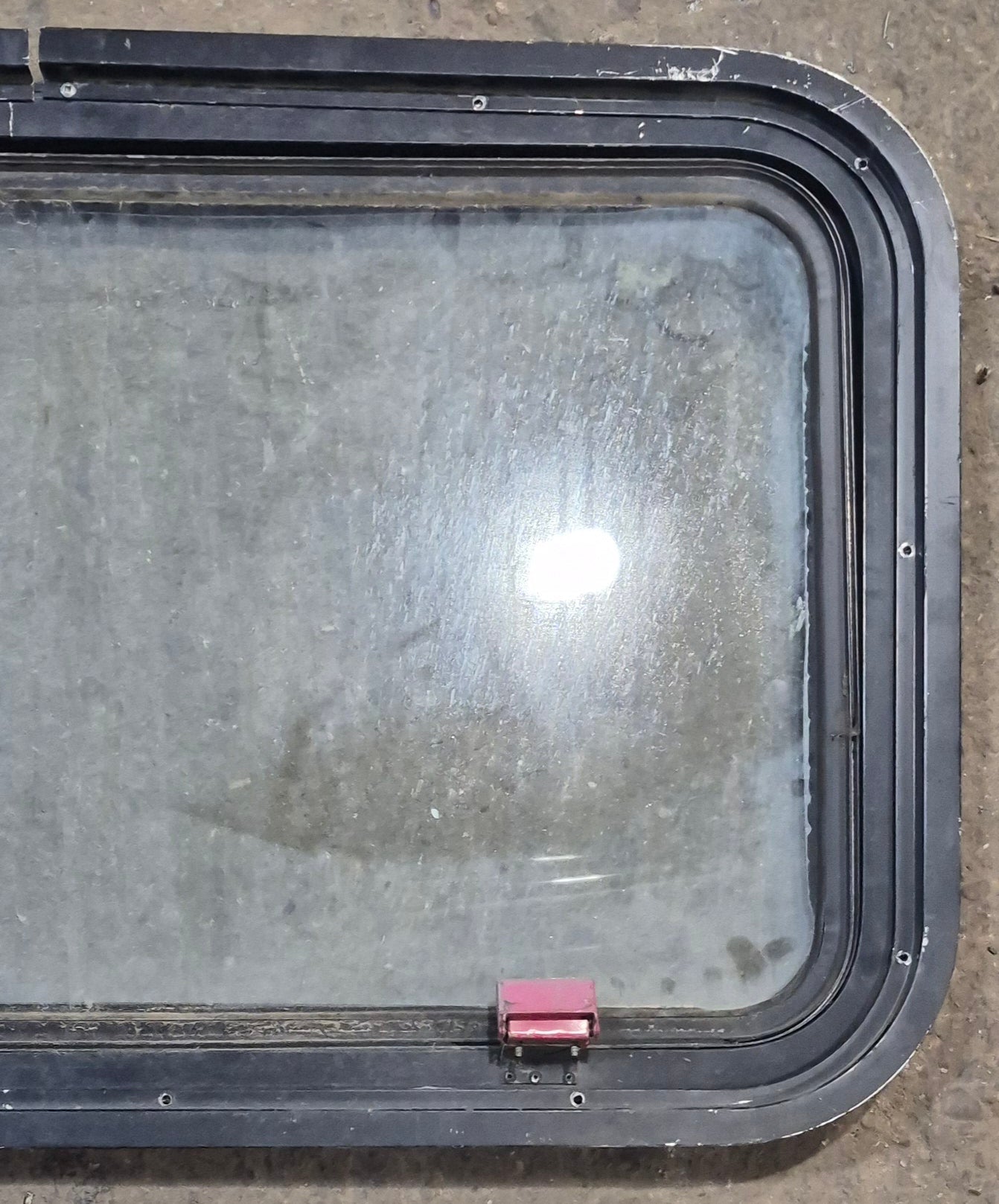 Used Black Radius Emergency Opening Window : 35 1/2" W x 19 1/2" H x 1 1/2" D - Young Farts RV Parts