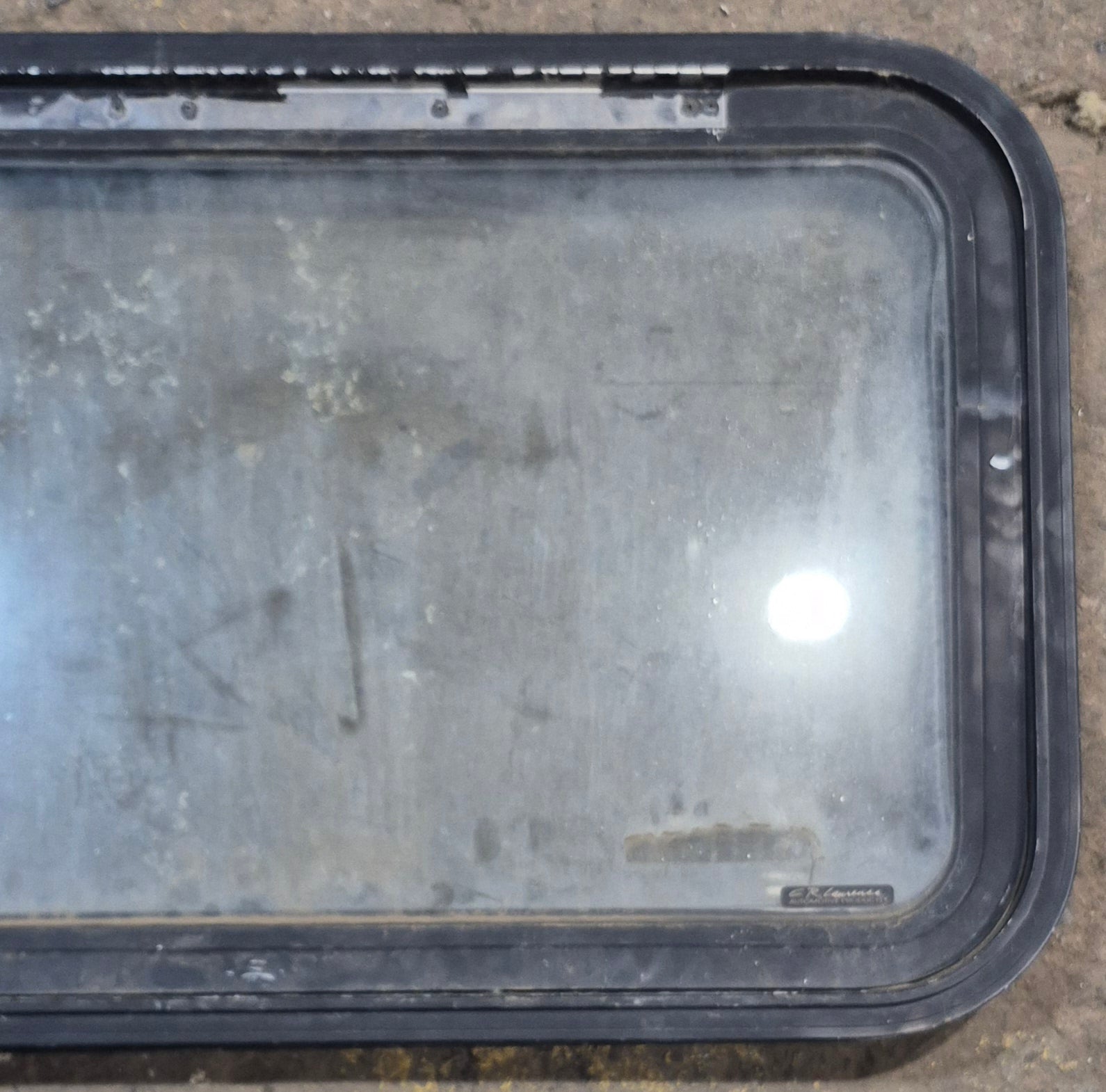 Used Black Radius Emergency Opening Window : 35 1/2" W x 19 1/2" H x 1 1/2" D - Young Farts RV Parts