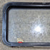 Used Black Radius Emergency Opening Window : 35 1/4" W x 18 1/2" H x 1 7/8" - Young Farts RV Parts