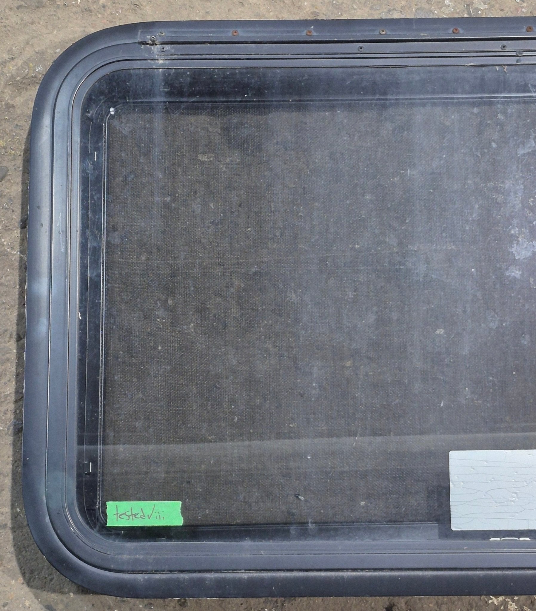 Used Black Radius Emergency Opening Window : 35 1/4" W x 21 1/2" H x 1 3/4" D - Young Farts RV Parts