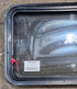 Used Black Radius Emergency Opening Window : 35 1/4" W x 21 1/4" H x 1 3/4" D - Young Farts RV Parts