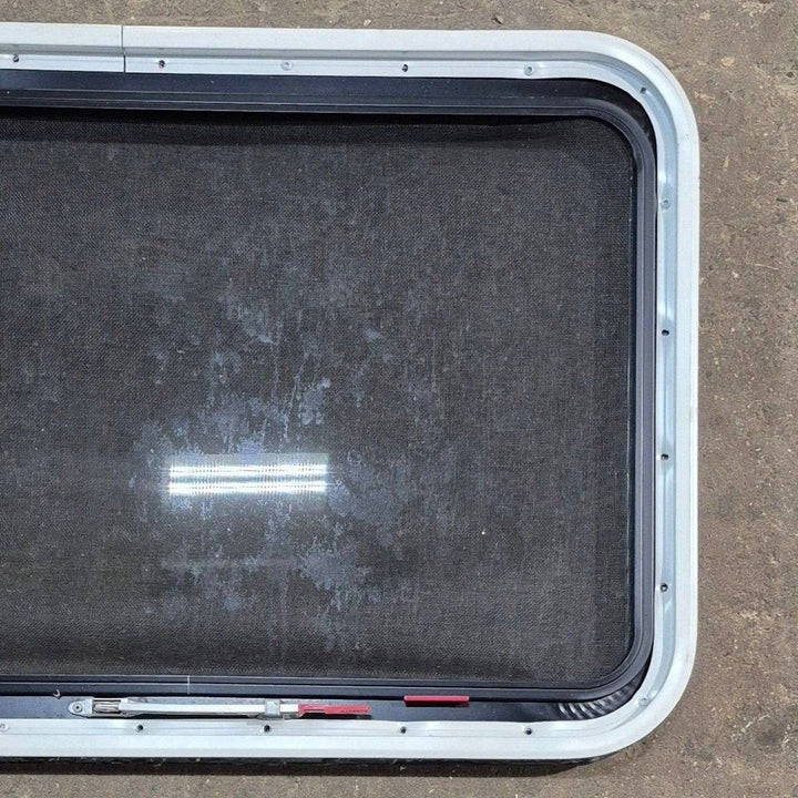 Used Black Radius Emergency Opening Window - 35 1/8" X 21 1/4" X 1 7/8" - Young Farts RV Parts