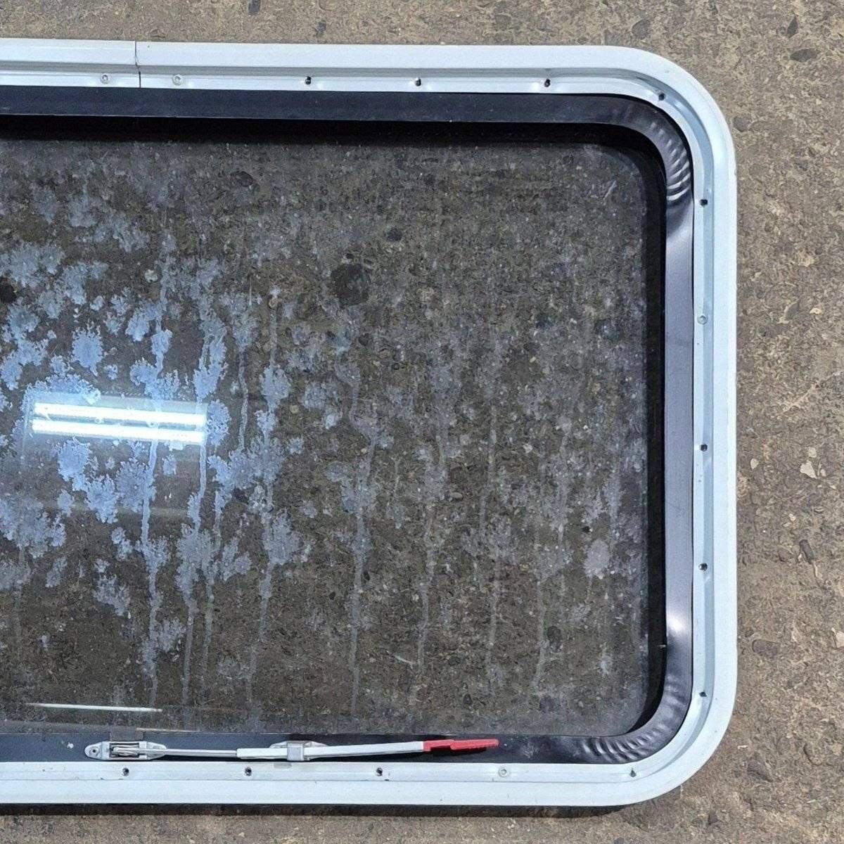 Used Black Radius Emergency Opening Window - 35 1/8" X 21 1/4" X 1 7/8" - Young Farts RV Parts