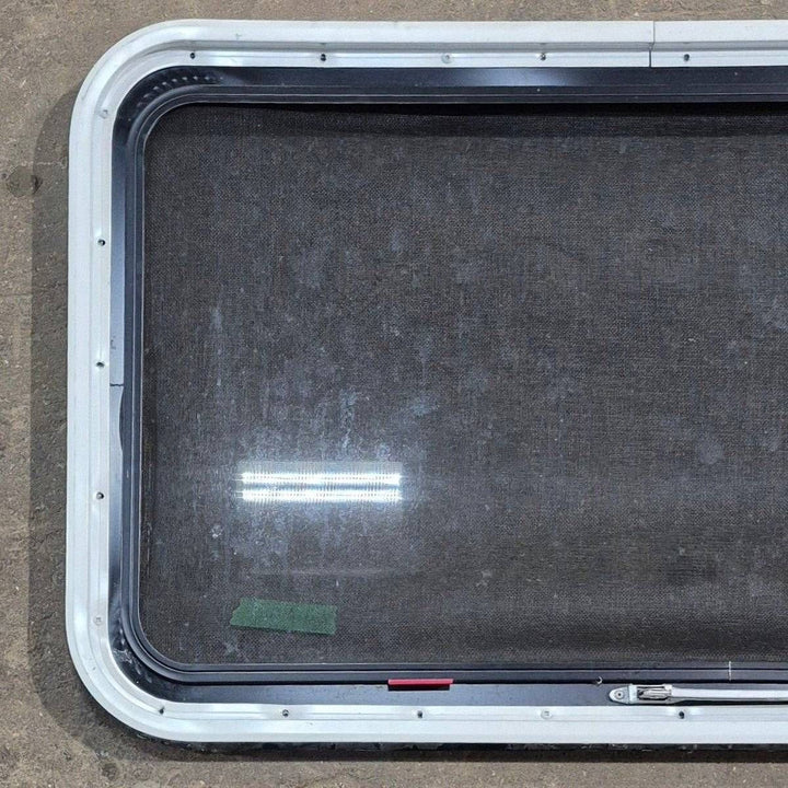 Used Black Radius Emergency Opening Window - 35 1/8" X 21 1/4" X 1 7/8" - Young Farts RV Parts