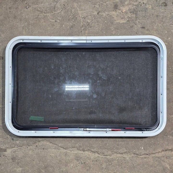 Used Black Radius Emergency Opening Window - 35 1/8" X 21 1/4" X 1 7/8" - Young Farts RV Parts