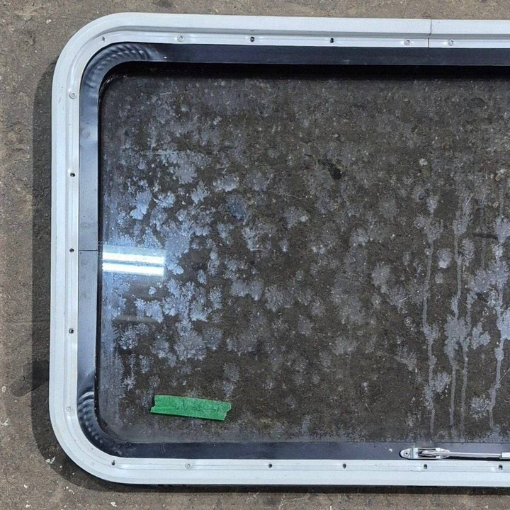 Used Black Radius Emergency Opening Window - 35 1/8" X 21 1/4" X 1 7/8" - Young Farts RV Parts