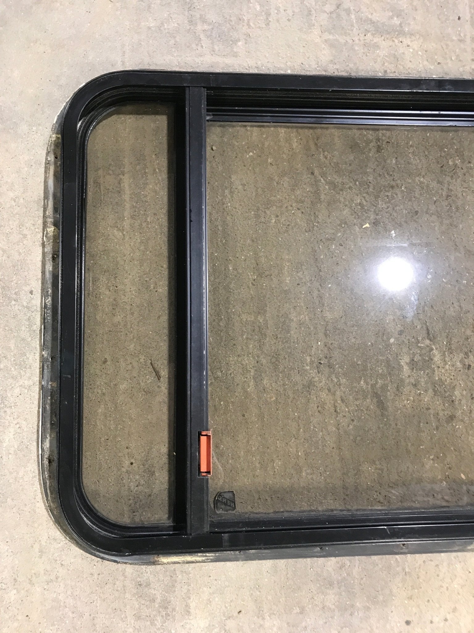 Used Black Radius Emergency Opening Window : 36 1/2" W x 23 1/2" H x 1 1/2" - Young Farts RV Parts