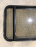 Used Black Radius Emergency Opening Window : 36 1/2" W x 23 1/2" H x 1 1/2" - Young Farts RV Parts