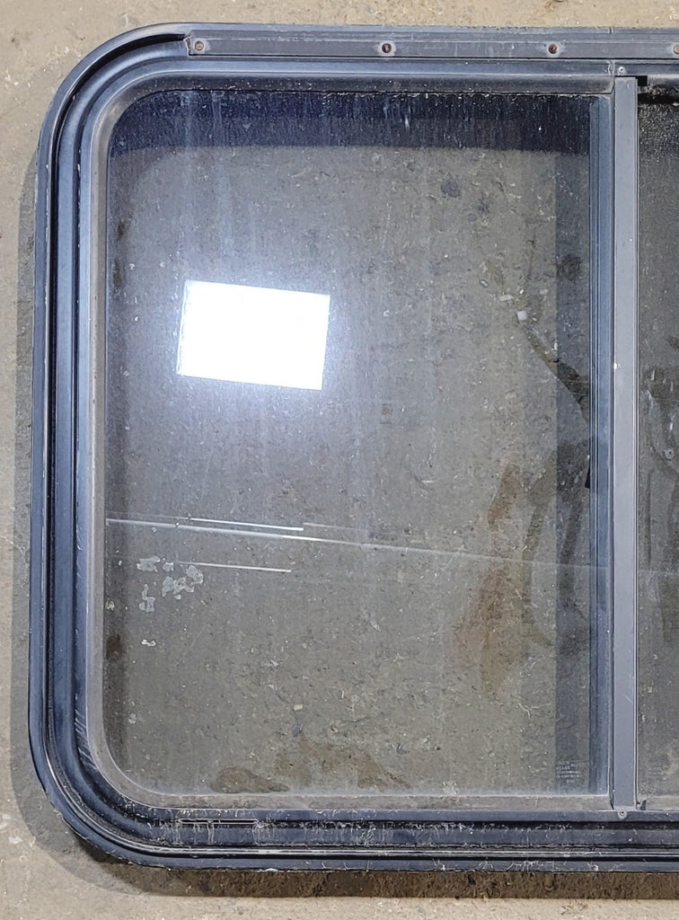 Used Black Radius Emergency Opening Window : 36 3/4" W x 27" H x 1 3/4" - Young Farts RV Parts