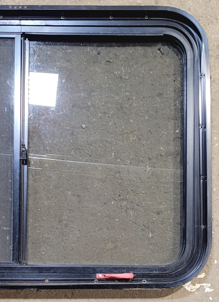 Used Black Radius Emergency Opening Window : 36 3/4" W x 27" H x 1 3/4" - Young Farts RV Parts