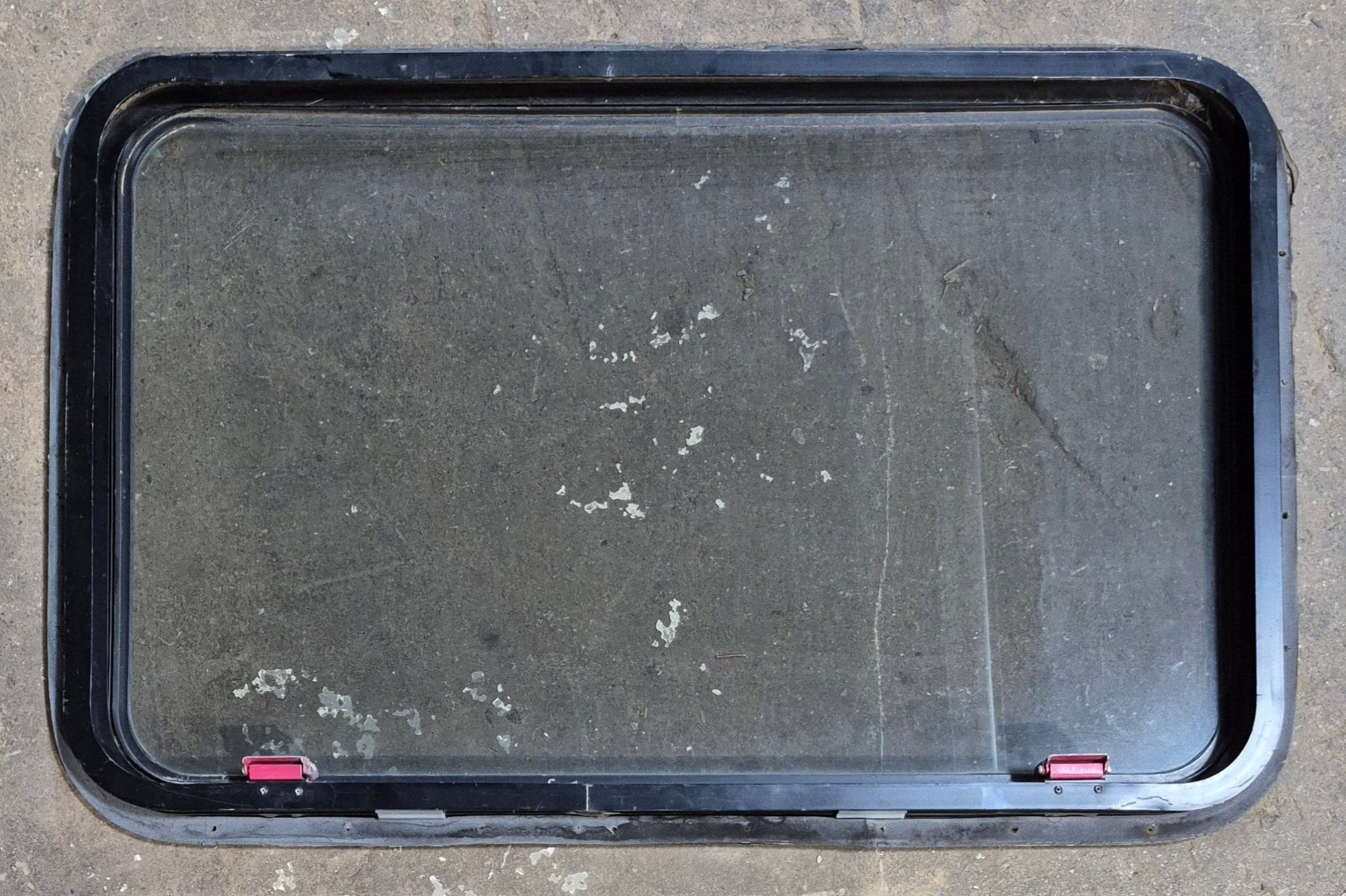 Used Black Radius Emergency Opening Window : 36 3/4 x 23 1/2 x 1 1/2" D - Young Farts RV Parts