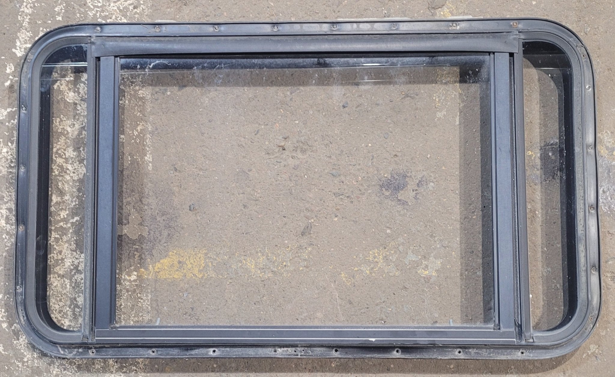 Used Black Radius Emergency Opening Window : 37 3/4" W x 21 3/4" H x 1 3/4" D - Young Farts RV Parts