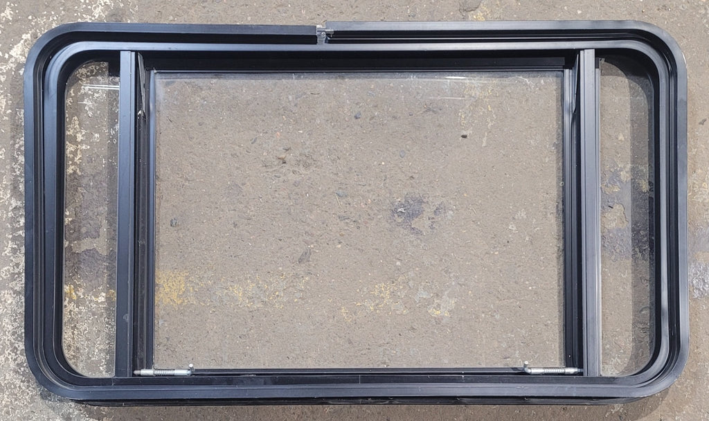 Used Black Radius Emergency Opening Window : 37 3/4" W x 21 3/4" H x 1 3/4" D - Young Farts RV Parts