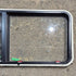 Used Black Radius Emergency Opening Window - 41.625 X 21.875 X 1.375 - Young Farts RV Parts