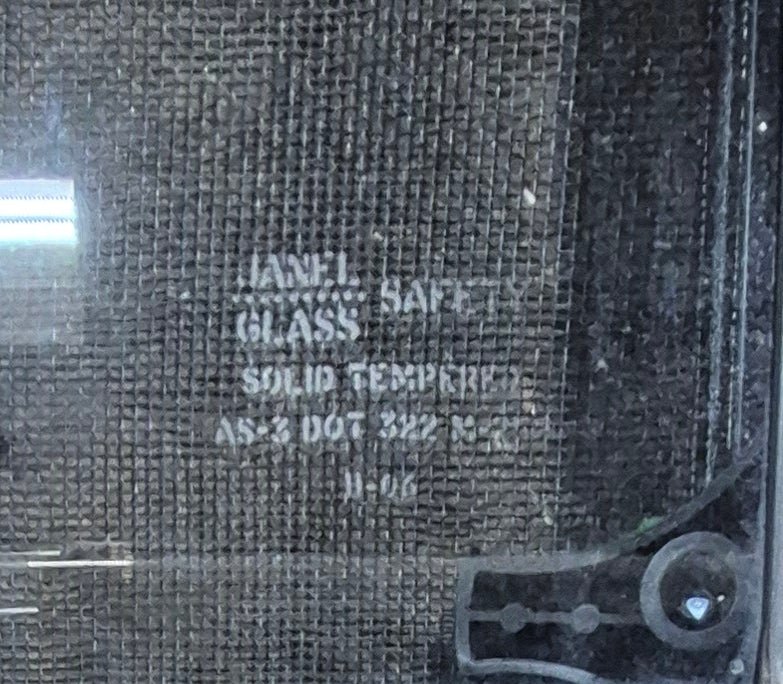 Used Black Radius Emergency Opening Window : 47 1/4" W x 21 1/4" H x 1 3/4" D - Young Farts RV Parts