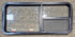 Used Black Radius Emergency Opening Window : 47 1/4" W x 21 1/4" H x 1 7/8" - Young Farts RV Parts