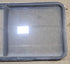 Used Black Radius Emergency Opening Window : 55 1/4" W x 25 1/2" H x 1 7/8" - Young Farts RV Parts
