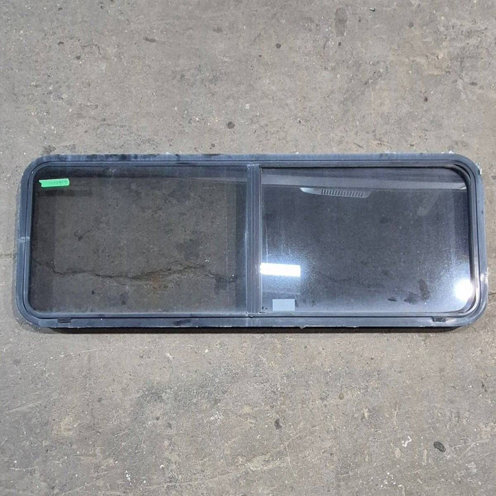 Used Black Radius Emergency Opening Window - 60 X 21.75 X 1.875 - Young Farts RV Parts