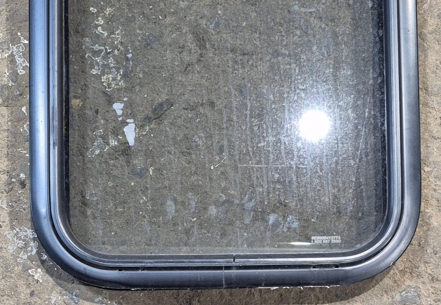 Used Black Radius Non Opening Window : 17 1/4" W x 21 1/2" H x 1 3/4" - Young Farts RV Parts