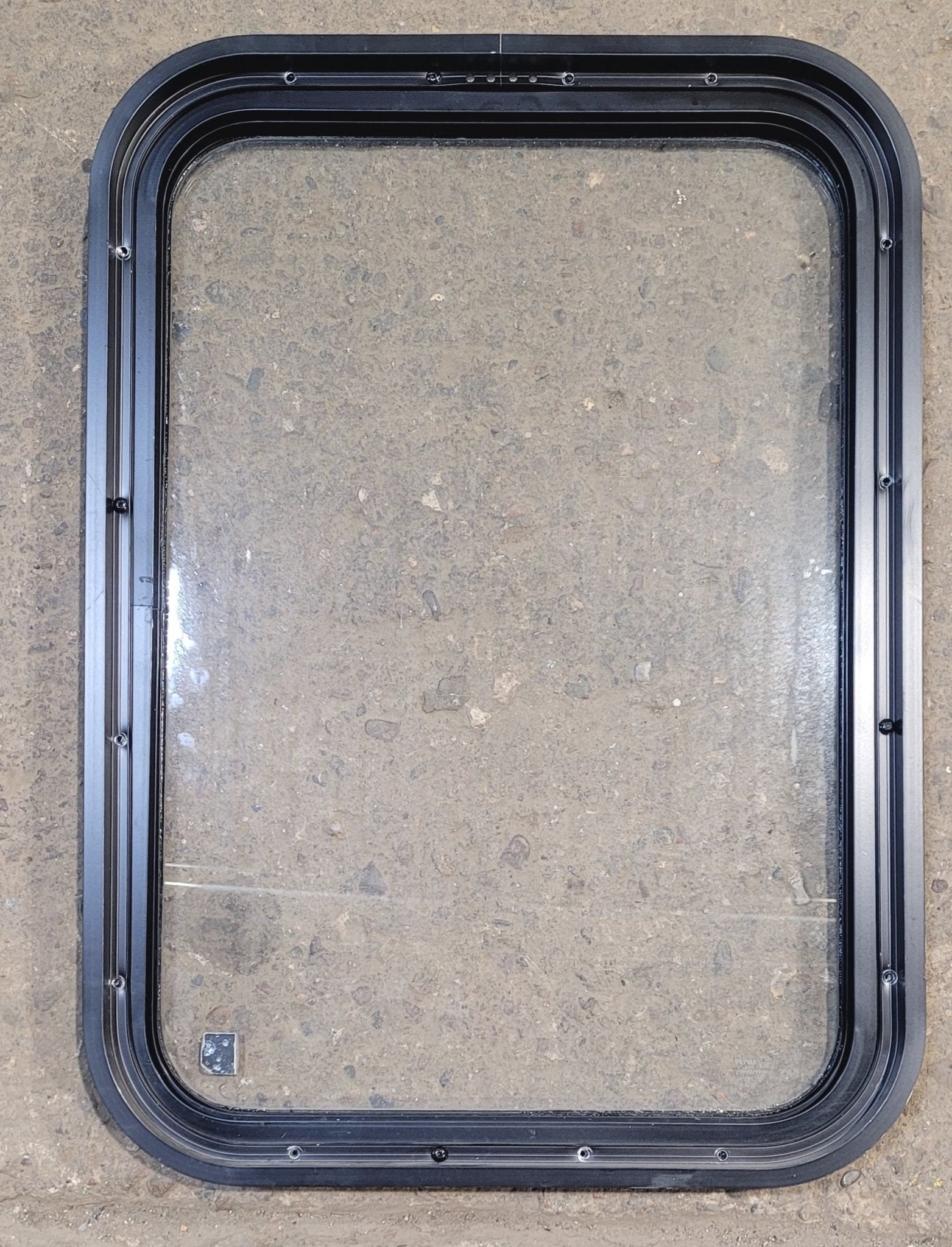 Used Black Radius Non Opening Window : 18 1/4" W x 25 3/4" H x 1 3/4" - Young Farts RV Parts