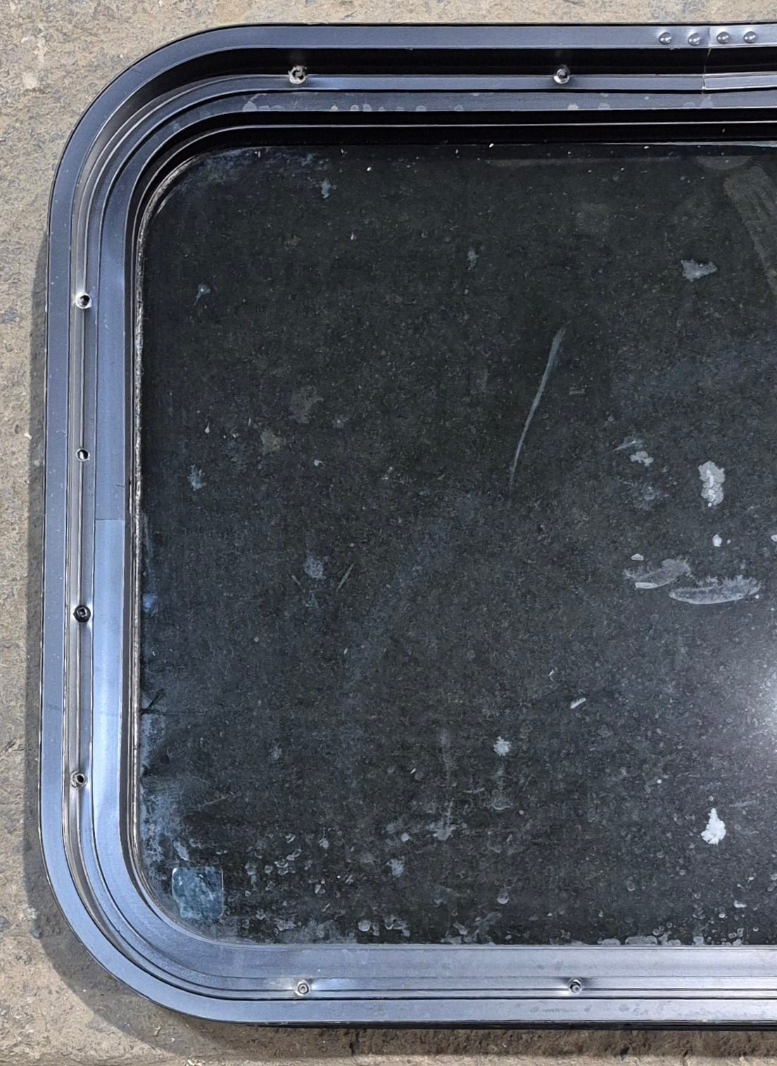 Used Black Radius Non Opening Window : 23 1/2