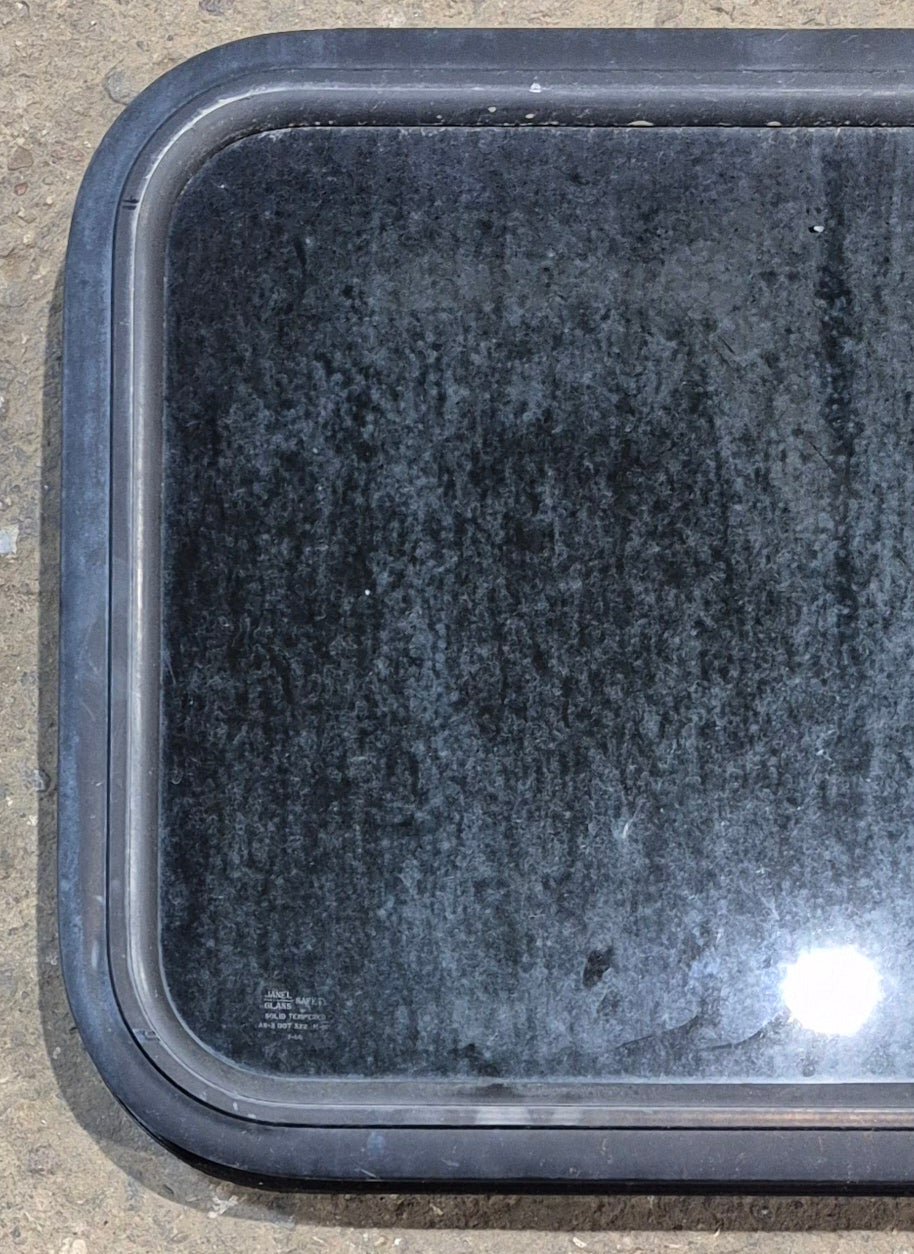 Used Black Radius Non Opening Window : 23 1/2" W x 17 1/4" H x 1 3/4" - Young Farts RV Parts