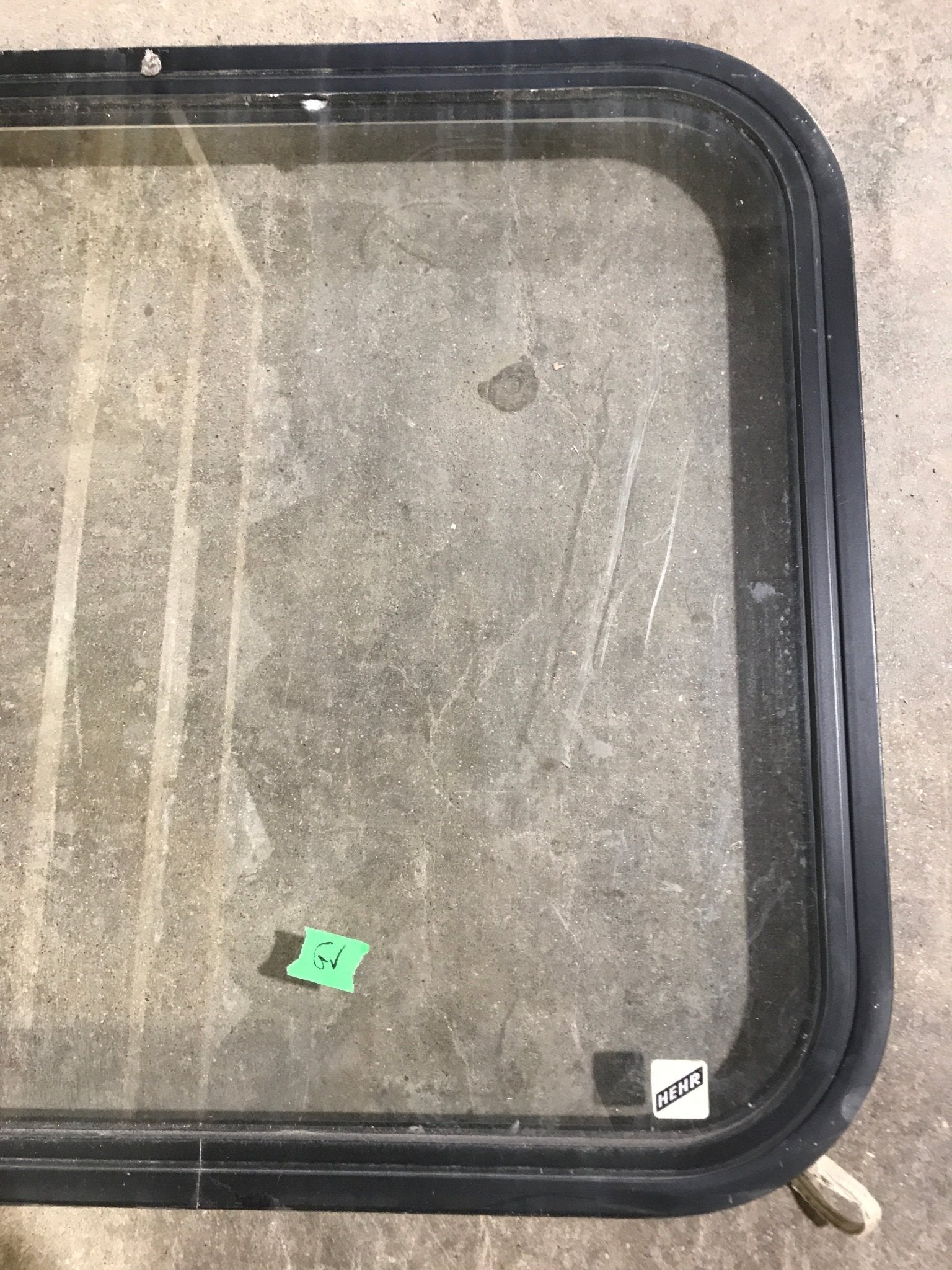 Used Black Radius Non Opening Window : 23 1/2" W x 22" H x 1 7/8" - Young Farts RV Parts