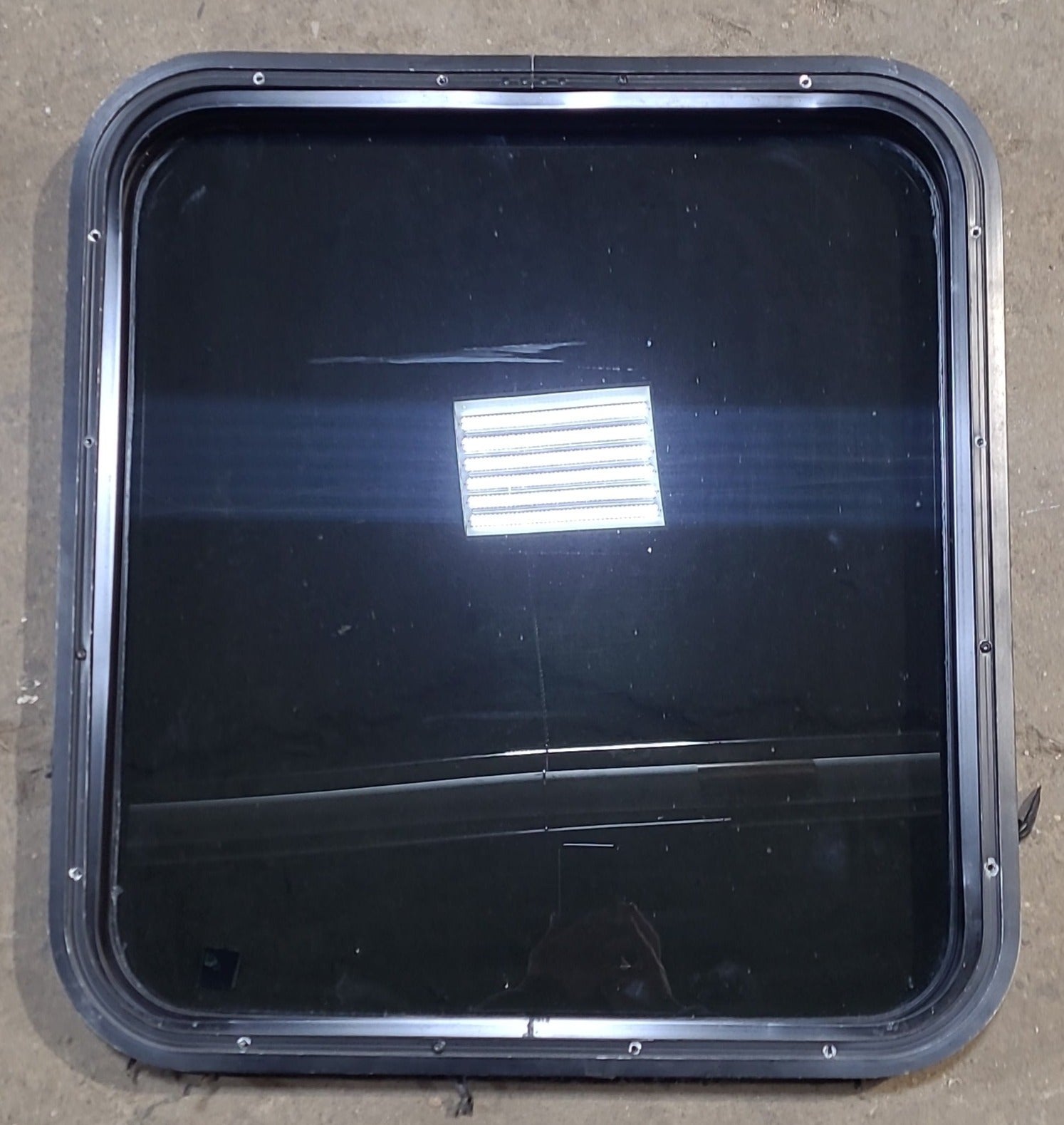 Used Black Radius Non Opening Window : 23 1/2" W x 25 1/2" H x 1 7/8" D - Young Farts RV Parts