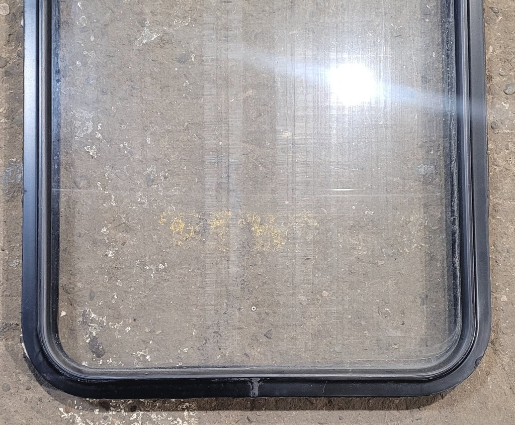 Used Black Radius Non Opening Window : 23 1/4" W x 34 3/4" H x 1 7/8" - Young Farts RV Parts