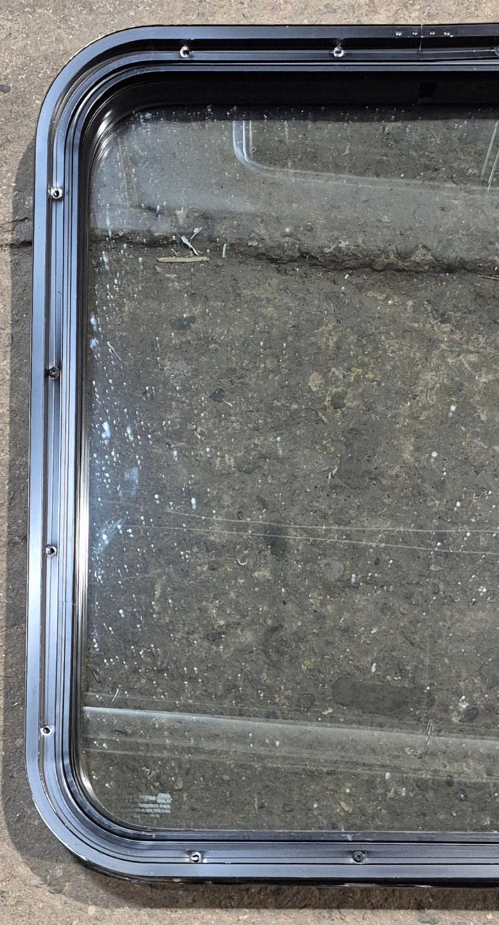 Used Black Radius Non Opening Window : 23 3/4" W x 26" H x 2" D - Young Farts RV Parts