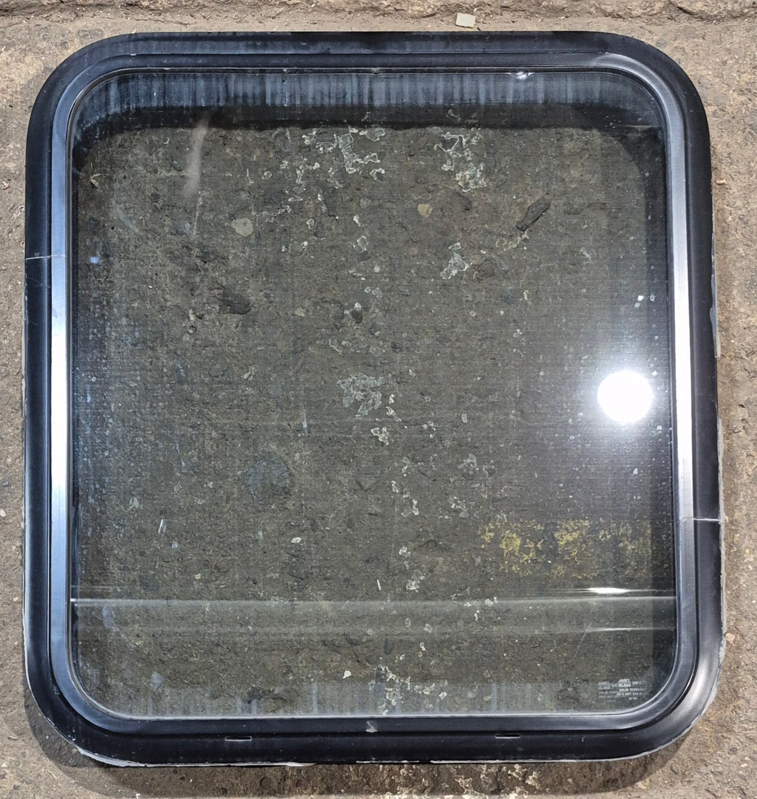 Used Black Radius Non Opening Window : 23 3/4" W x 26" H x 2" D - Young Farts RV Parts